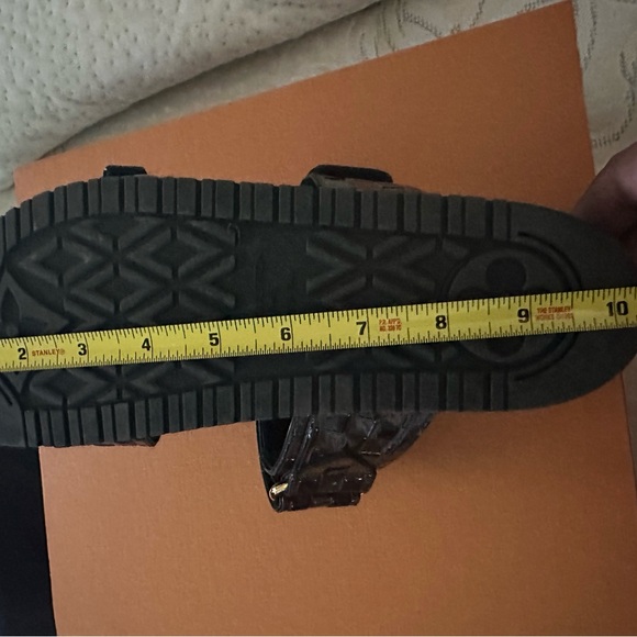 Louis Vuitton sandal.